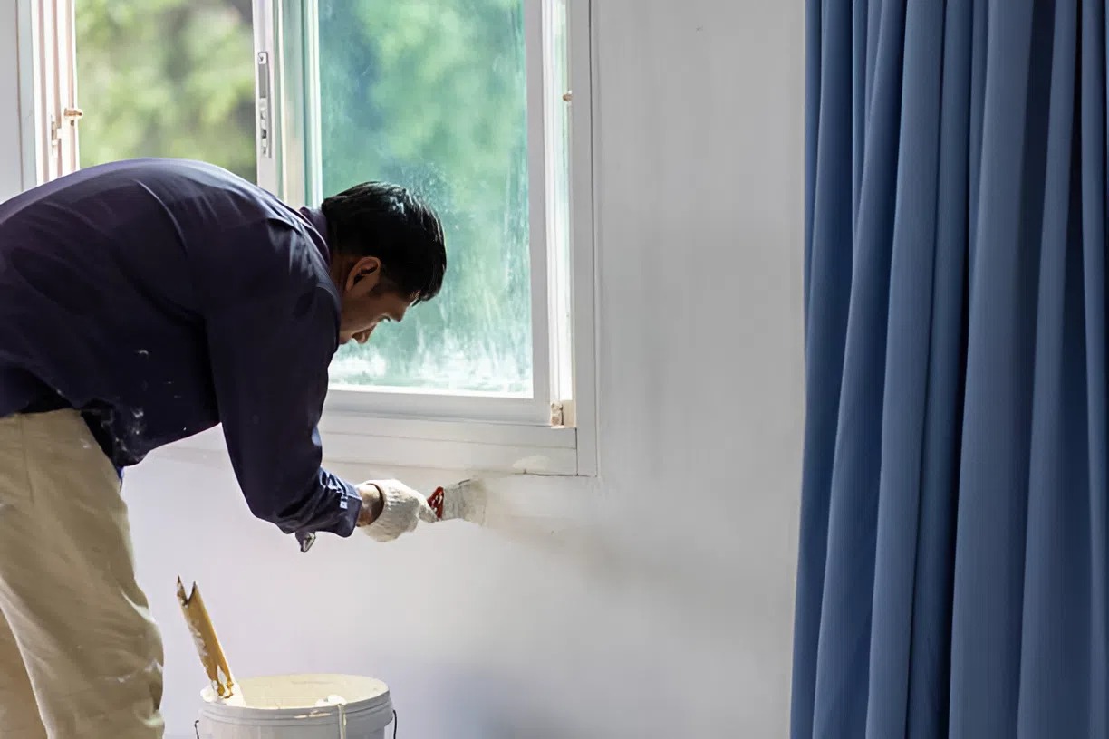 professional Painter in St. Pete Beach, FL painting a home interior