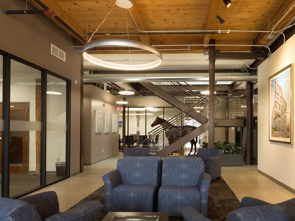 Choosing the Right Color for Every Office Layout According to a Painter in Largo, FL 1 Lobby with warm neutral wall paint and contrasting accent colors by a painter in Largo, FL