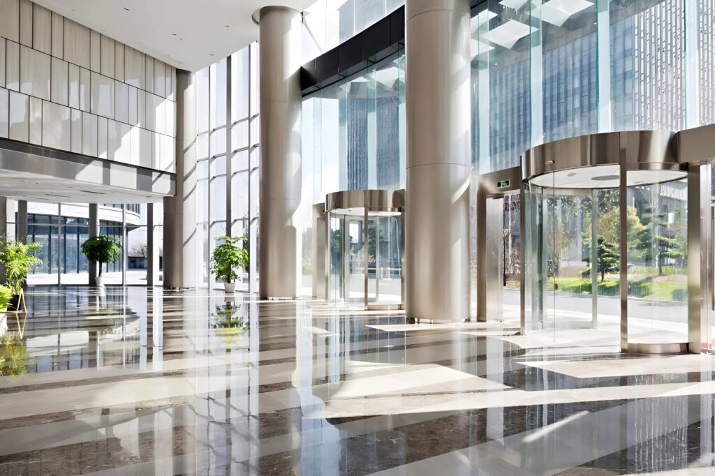 Bright commercial lobby interior with natural light and neutral finishes by a painter in St. Petersburg FL
